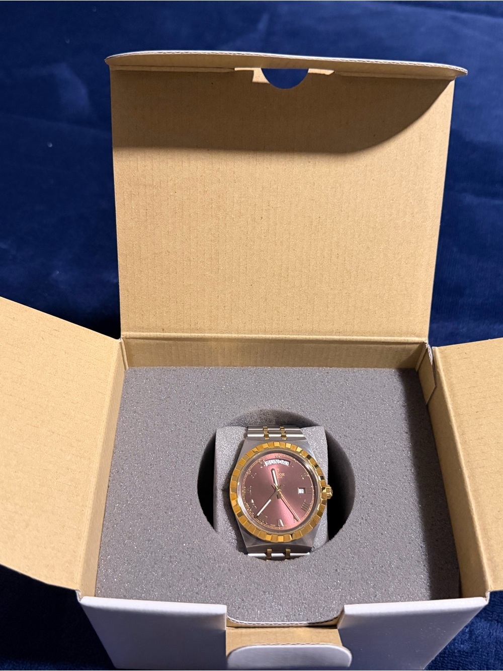 Tudor Two-Tone Watch with Burgundy Dial and Gold Accents